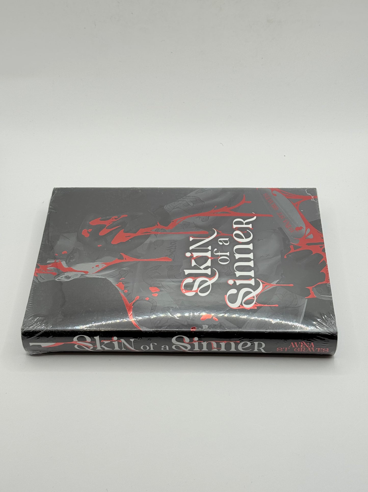 Skin of a Sinner by Avina St. Graves